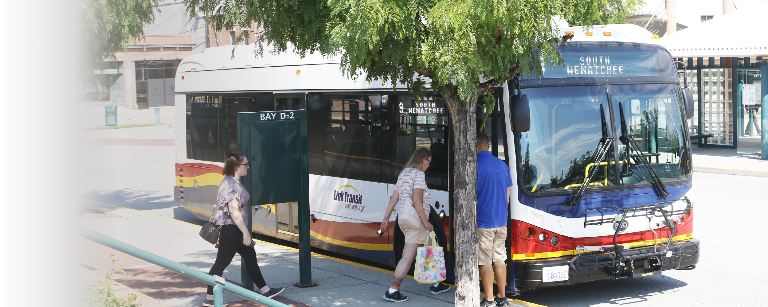 Link Transit route 9 bus stopped with people getting on